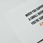 Motivational text promoting support for small businesses with a clean white background.